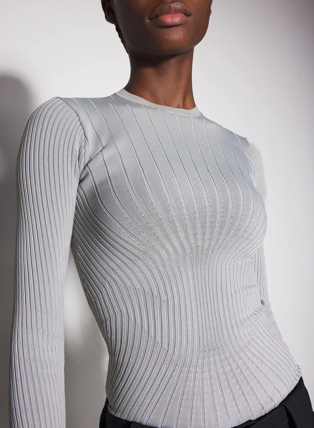 grey sculpting knit top