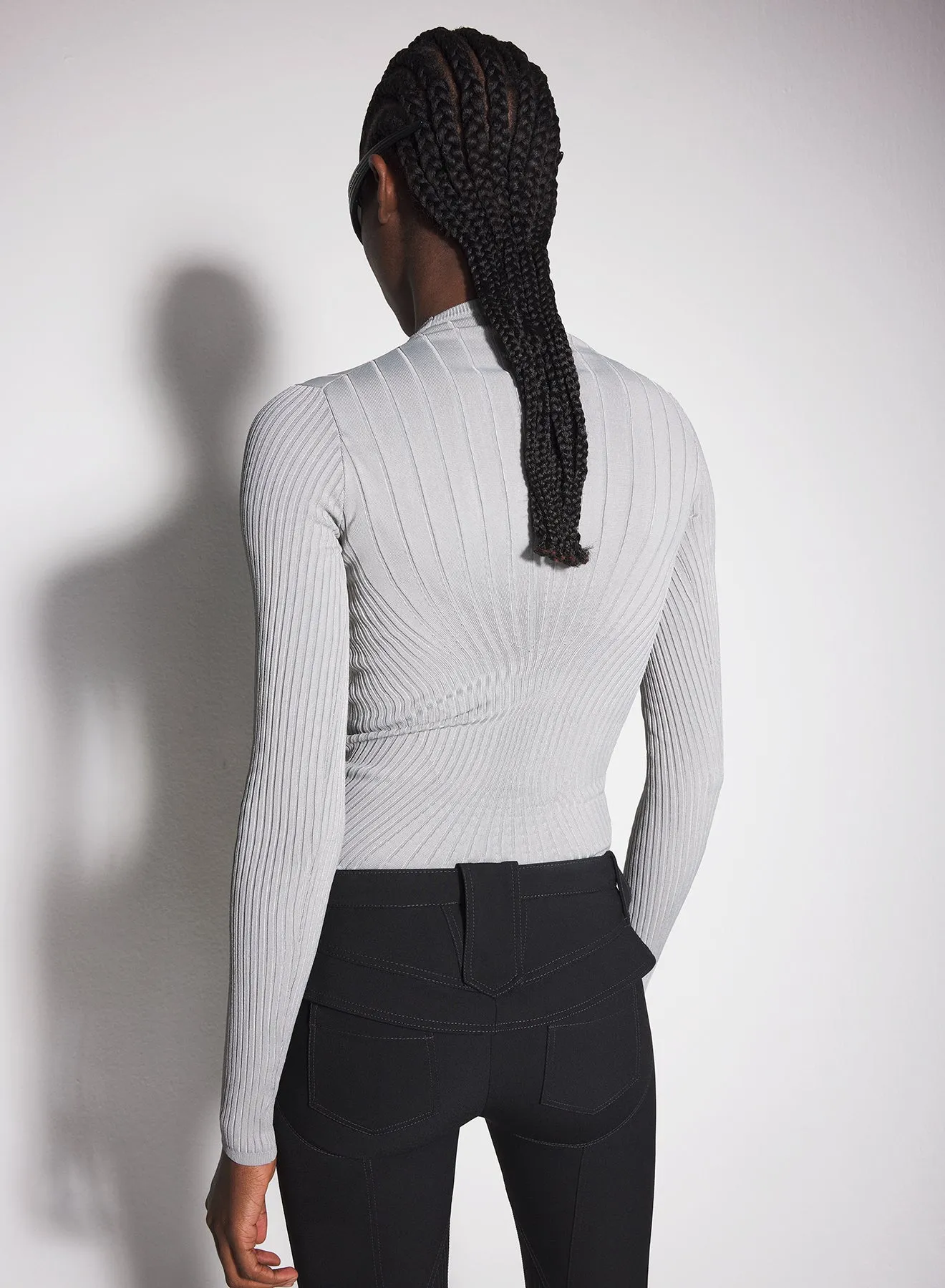 grey sculpting knit top